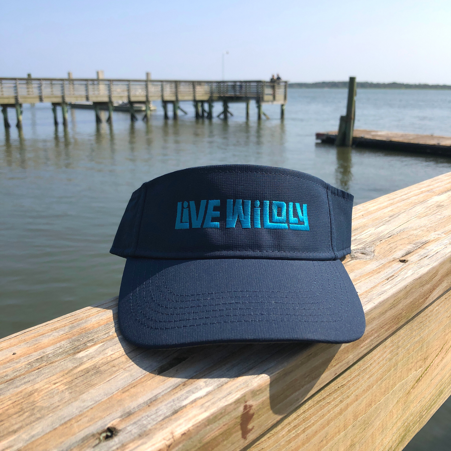 Live Wildly Performance Visors -Navy Front On Peer - Live Wildly
