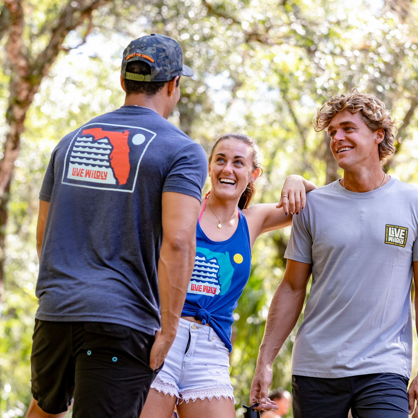 Live Wildly Florida Unisex Tee – Vintage Navy Back - Man Talking - Live Wildly