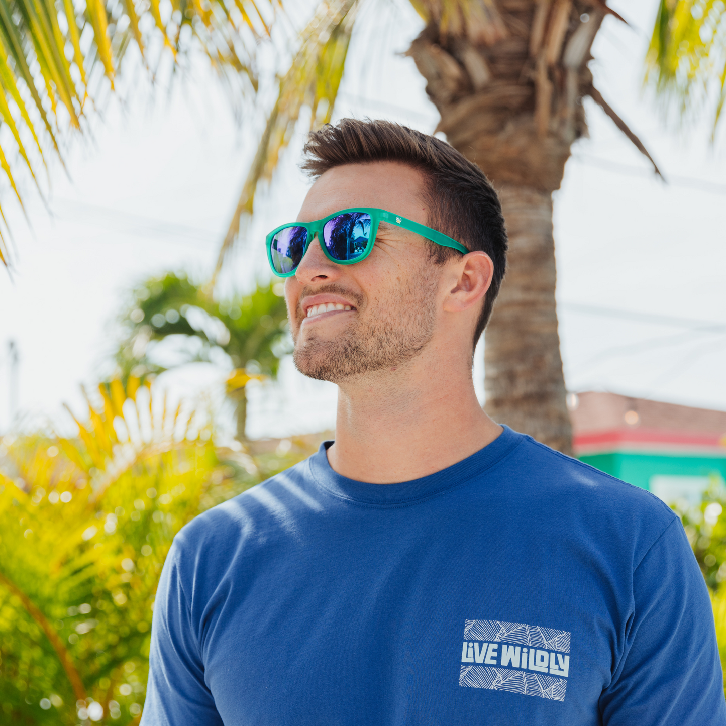 Live Wildly Polarized Sunglasses - Wearing Green - Live Wildly