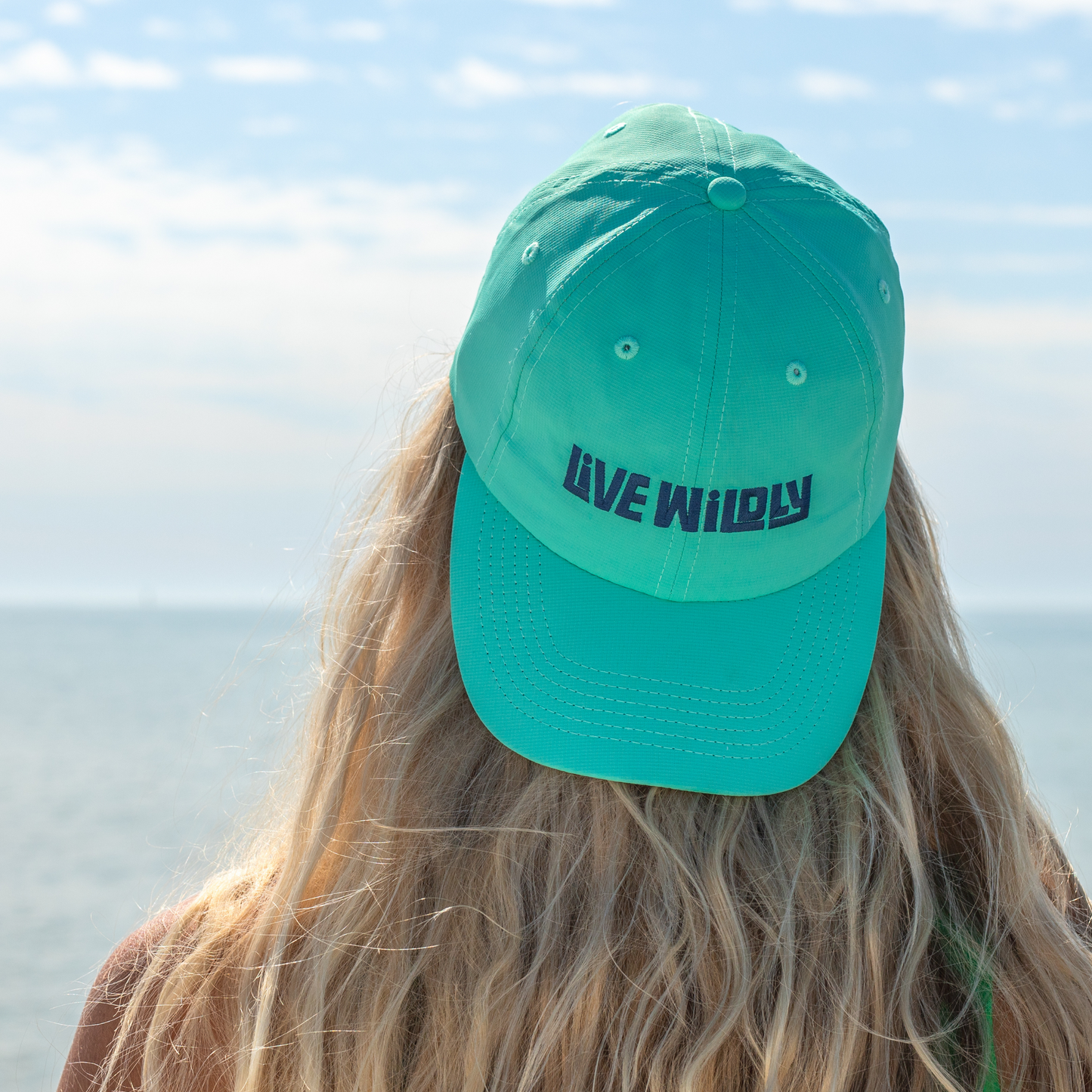 Live Wildly Performance Hats -Aqua Turned Backwards -Live Wildly