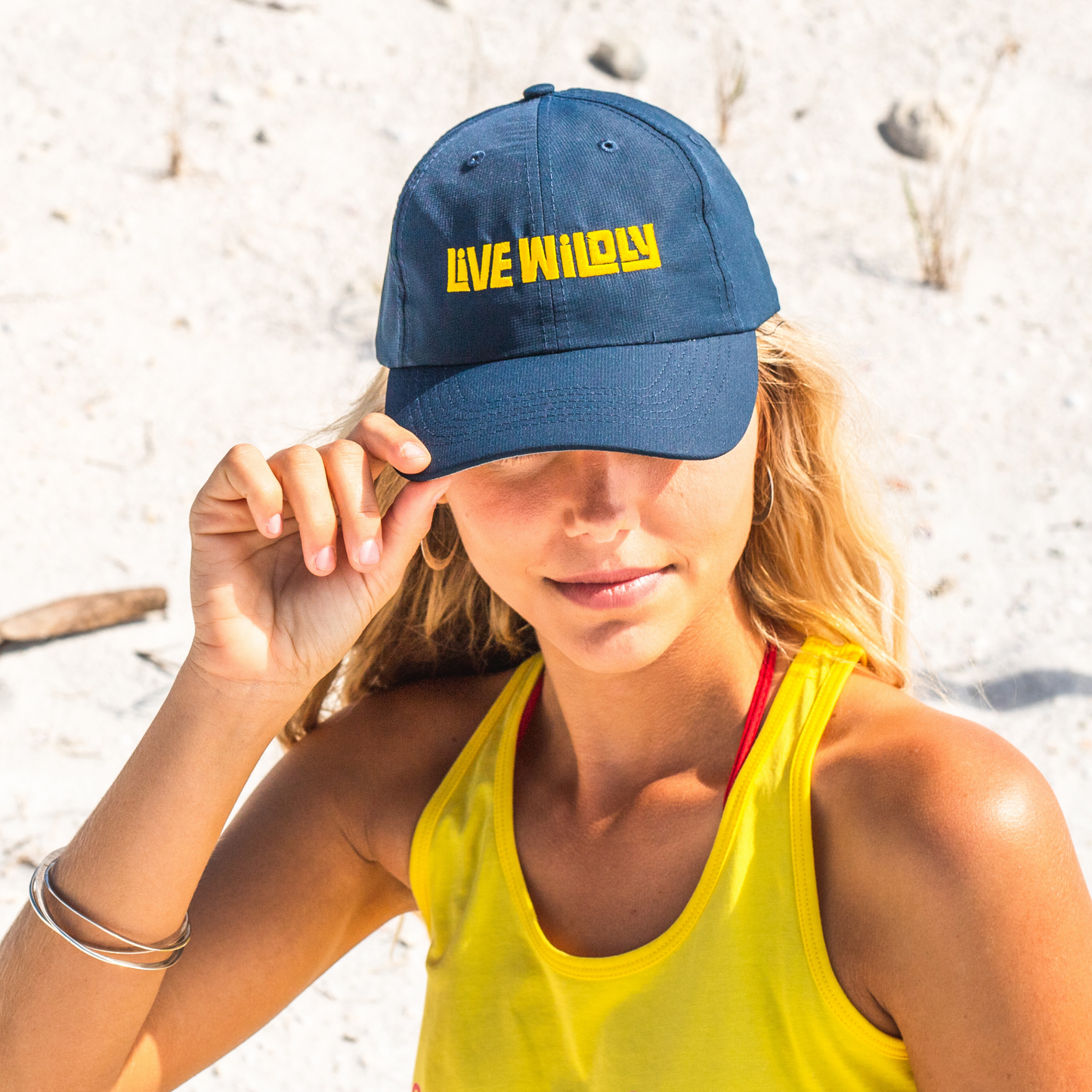 Live Wildly Performance Hats - Navy On Traveler - Live Wildly