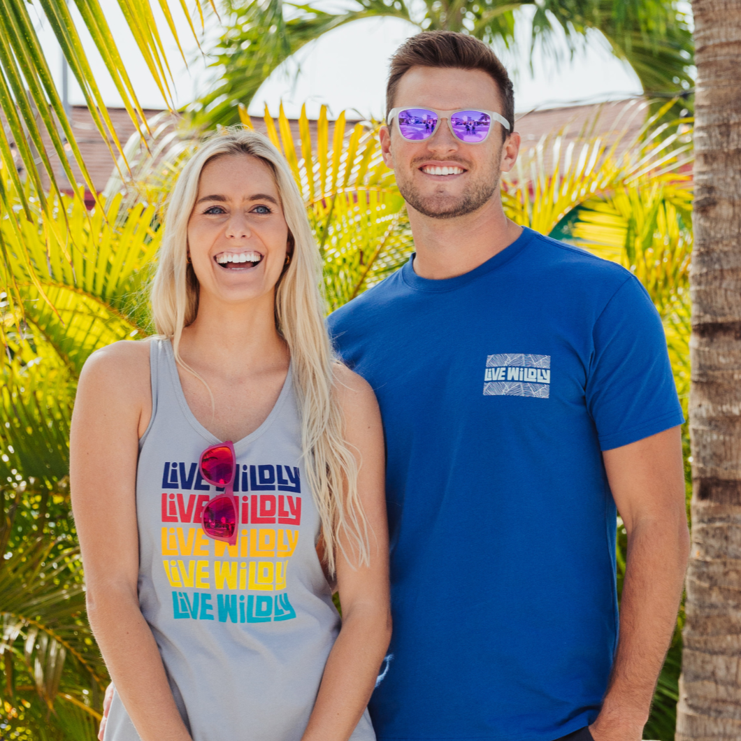 Live Wildly Polarized Sunglasses - Couple Wearing White and Pink - Live Wildly