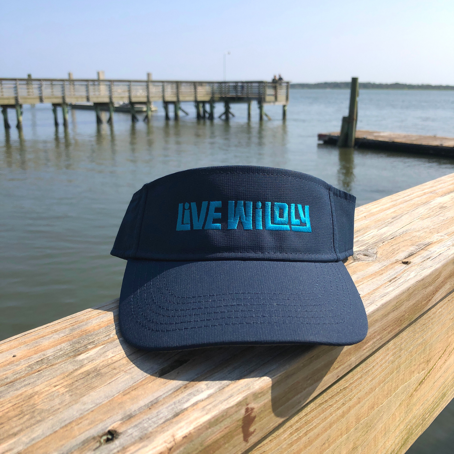 Load image into Gallery viewer, Live Wildly Performance Visors -Navy Front On Peer - Live Wildly 
