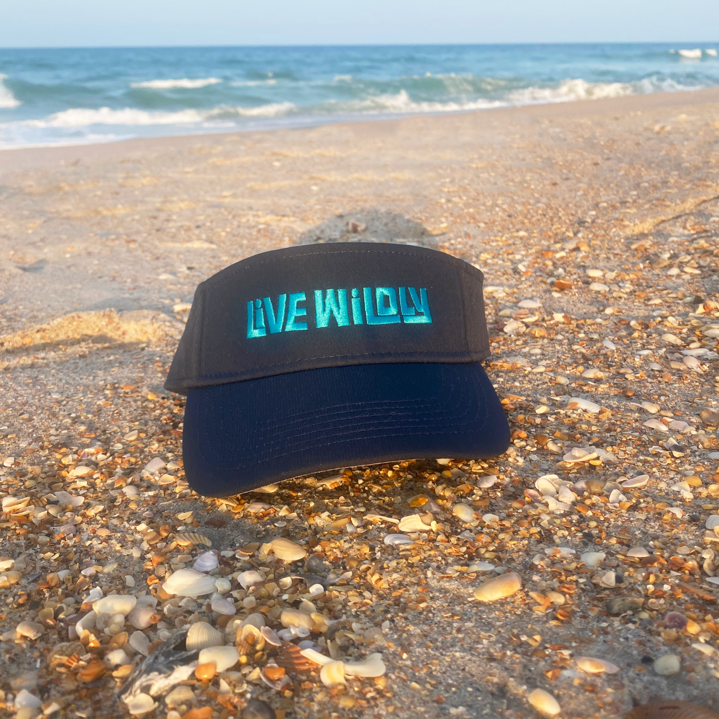 Load image into Gallery viewer, Live Wildly Performance Visors - Navy On Sea Shore - Live Wildly 
