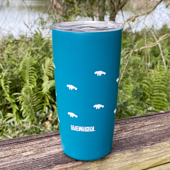 Load image into Gallery viewer, Live Wildly x MiiR 16 oz. Insulated Tumbler - Manatee Print - Side View On Railing

