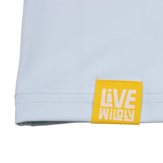 Load image into Gallery viewer, Live Wildly Unisex UPF 50+ Performance Shirt - Spring Blue - Isolated Tag - Live Wildly 
