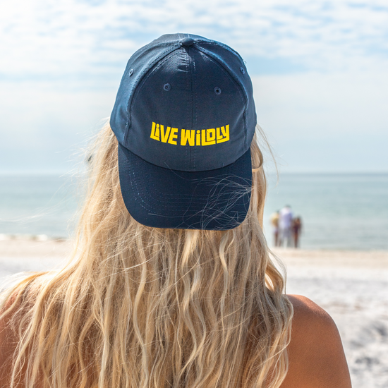 Load image into Gallery viewer, Live Wildly Performance Hats - Navy Turned Backwards -  Live Wildly 
