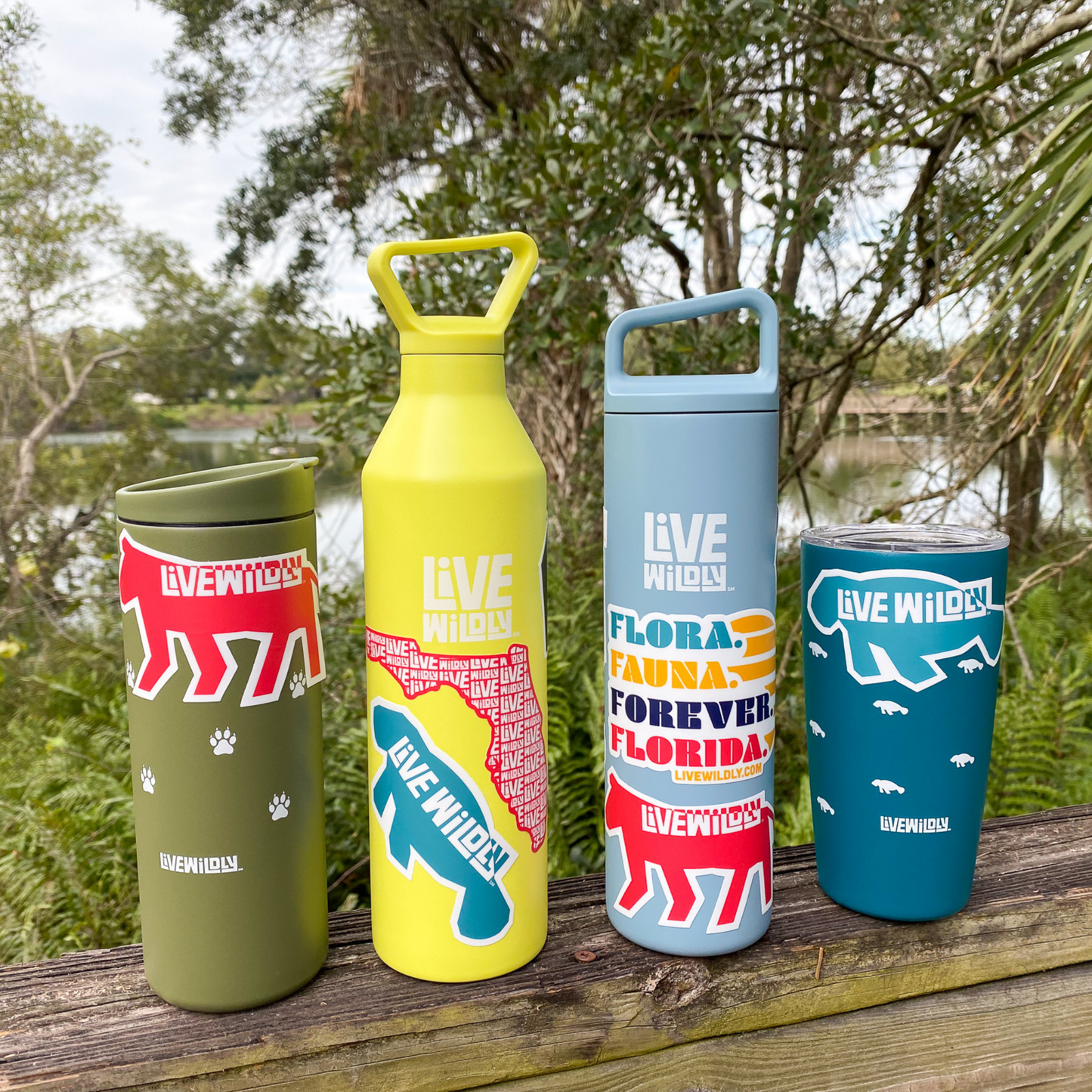 Load image into Gallery viewer, Flora, Fauna, Forever, FL Sticker  on water bottles and travel cups- Live Wildly 
