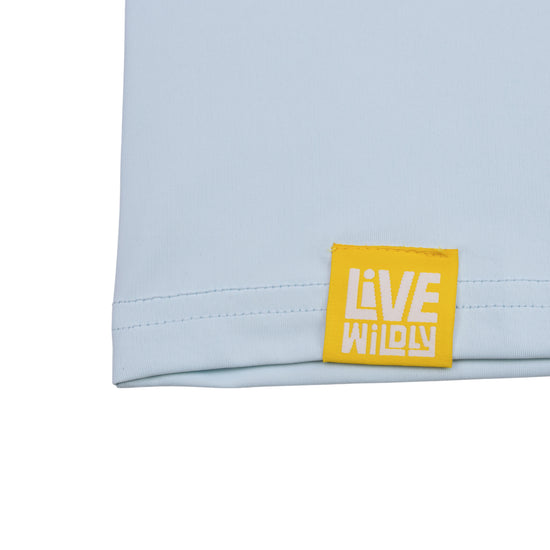 Load image into Gallery viewer, Live Wildly Youth UPF 50+ Performance Shirt - Spring Blue - Left Corner Tag -Live Wildly 
